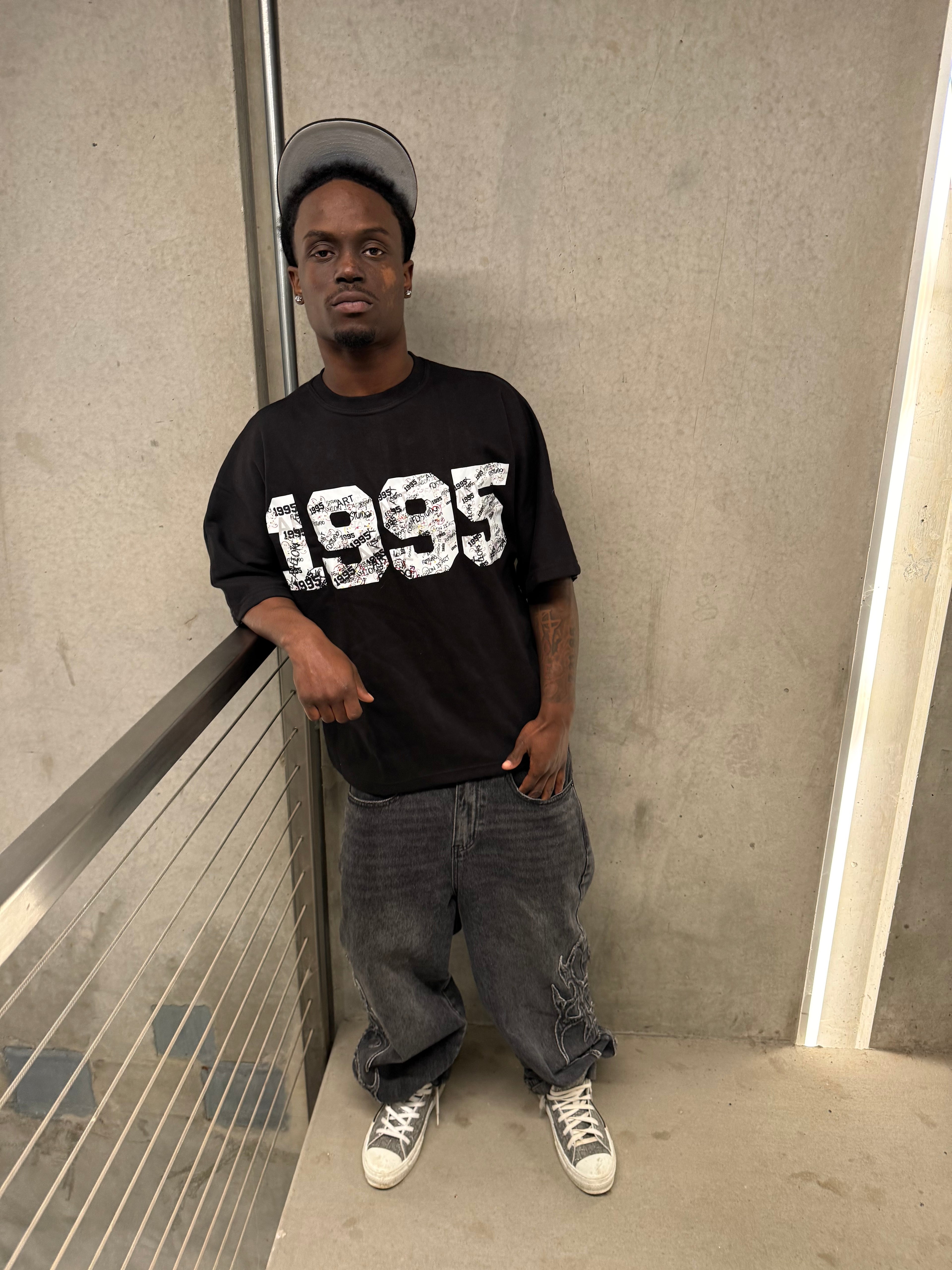 Black 1995 tee