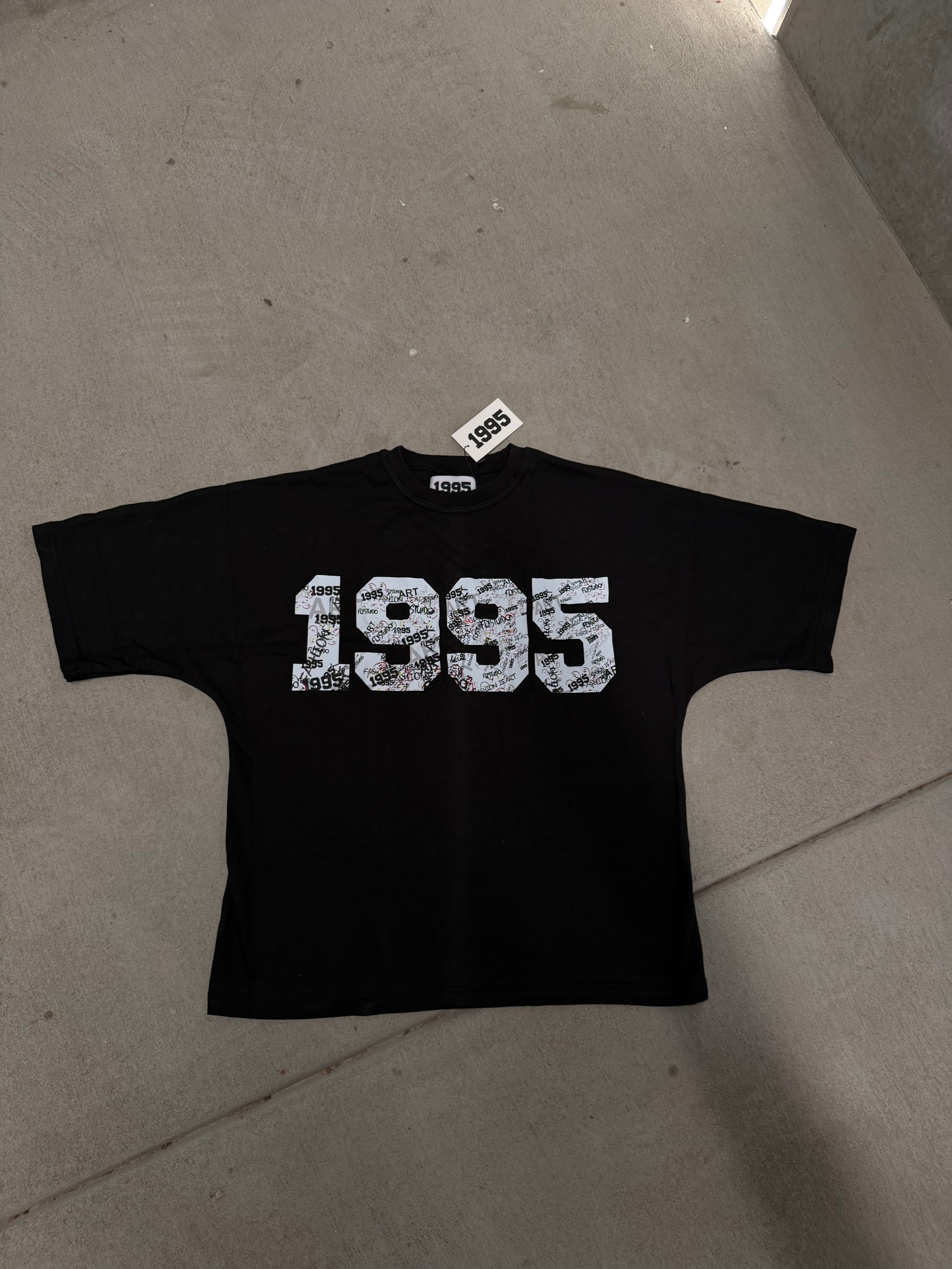 Black 1995 tee